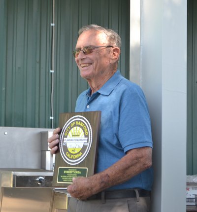 Everett Ehda was awarded a plaque for his 10 years of service as the Hanford Airport manager.